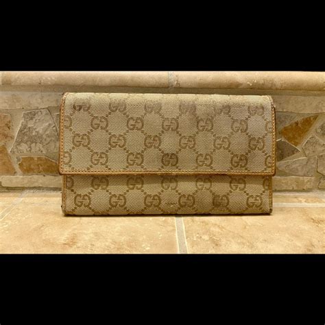 gucci monogram trifold wallet|Gucci wallet original.